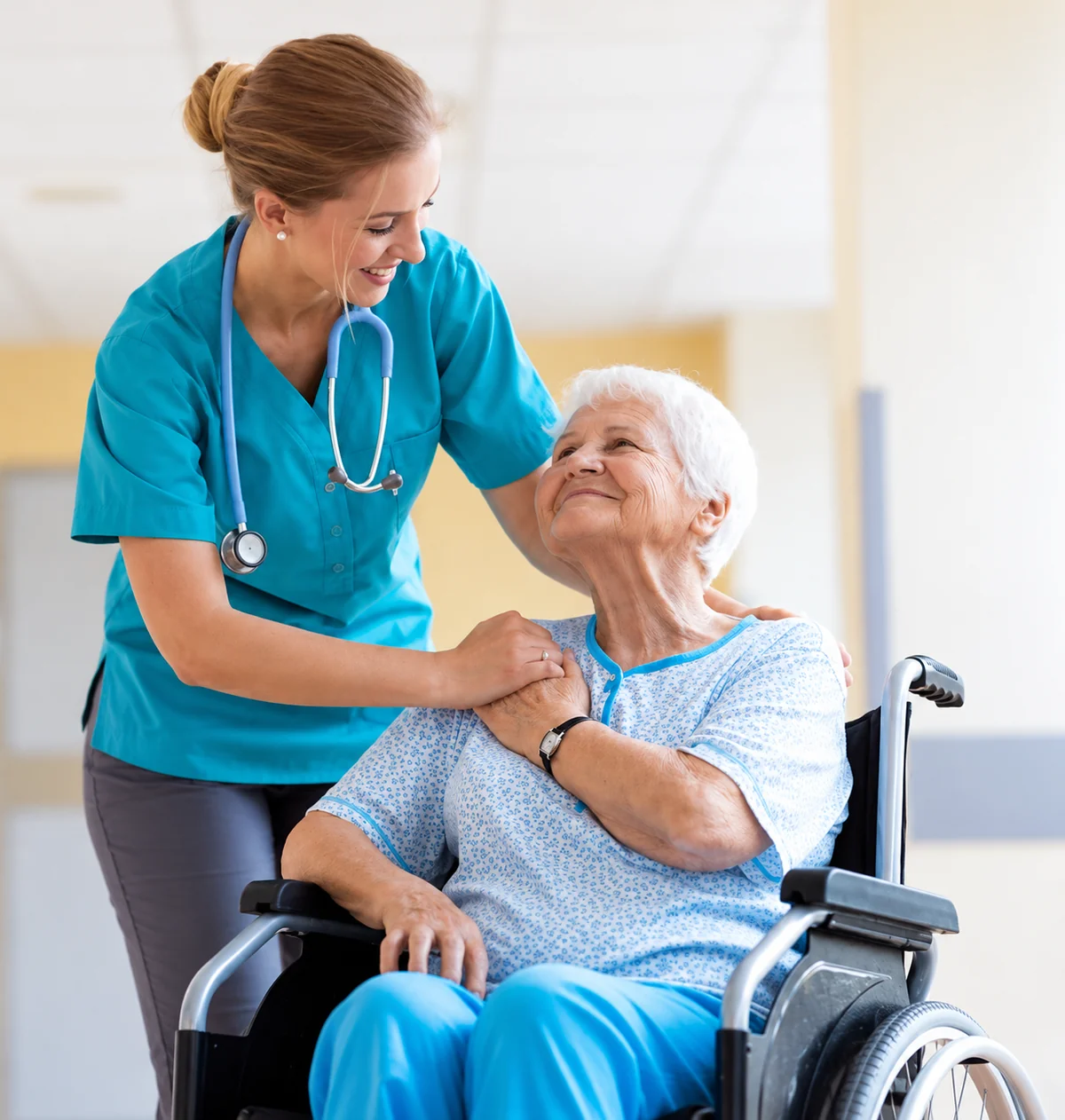 A nurse providing care and support to an older patient